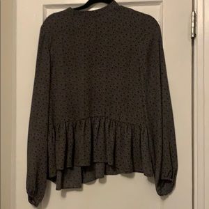 Size M peplum blouse with floral pattern